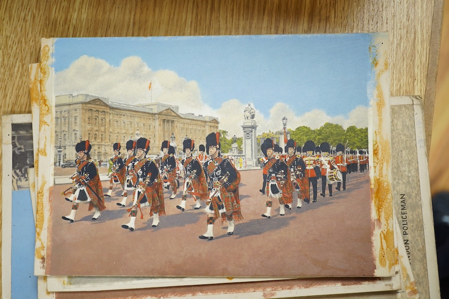A set of thirteen original hand coloured photographs for postcards, London Pageantry scenes to include Changing the guard at Buckingham Palace, Lifeguards in the mall, London policeman and Yeoman warders at St James Pala